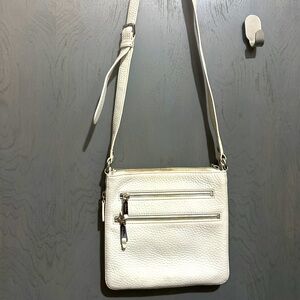 Cole Hahn White leather crossbody bag; Silver colored zipper and buckle